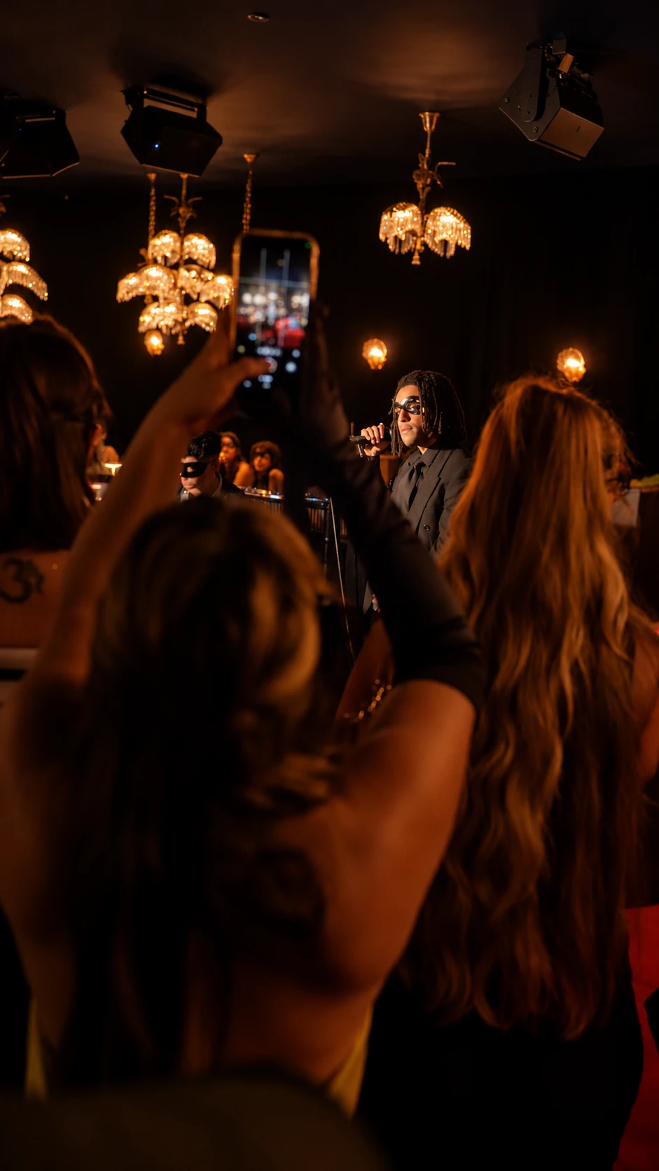 INNOCNT singing to masked guests at Session I