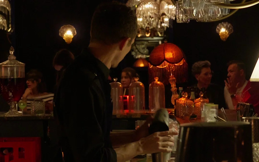Guests in conversation at The Court’s bar